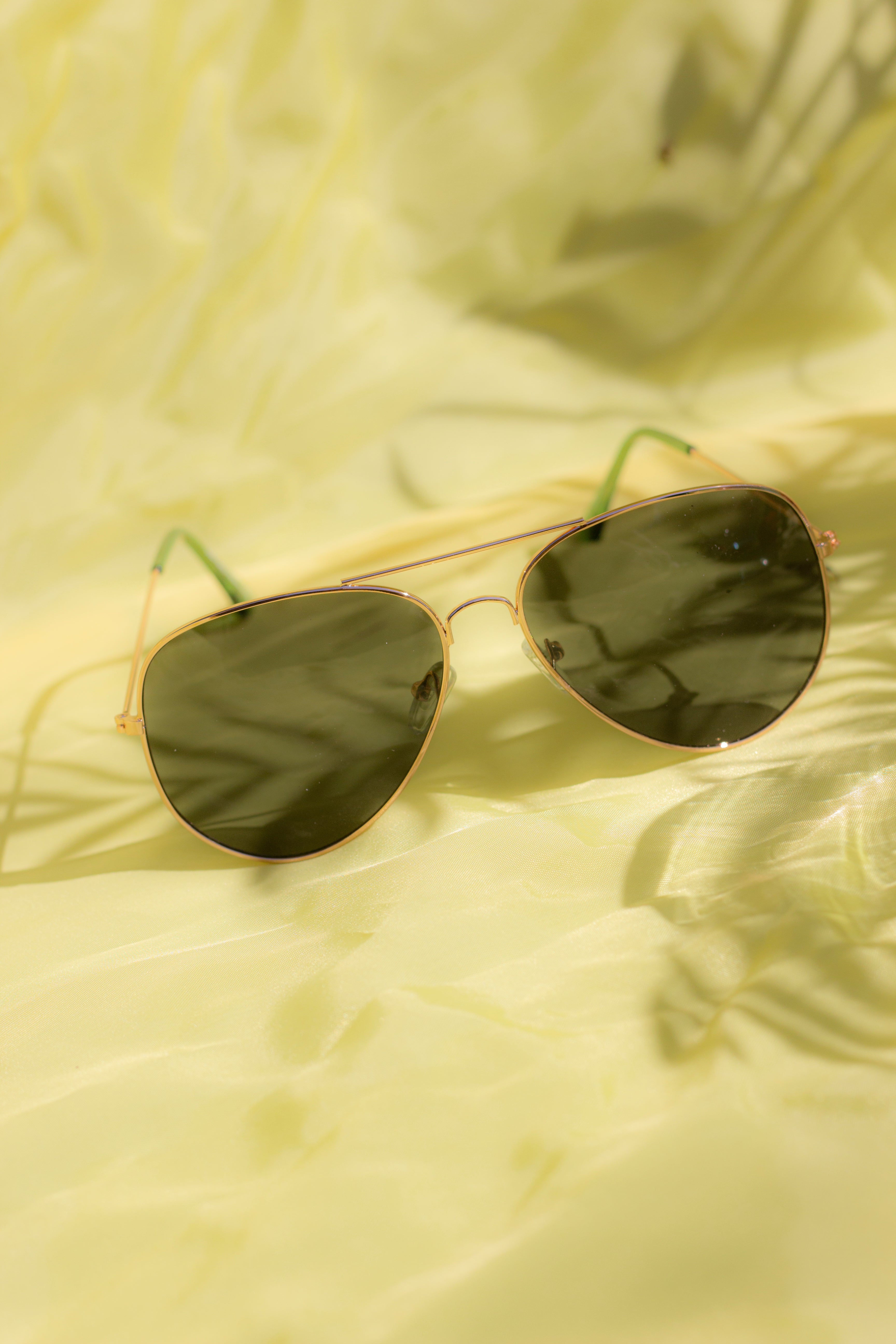 Green tinted hotsell aviator sunglasses