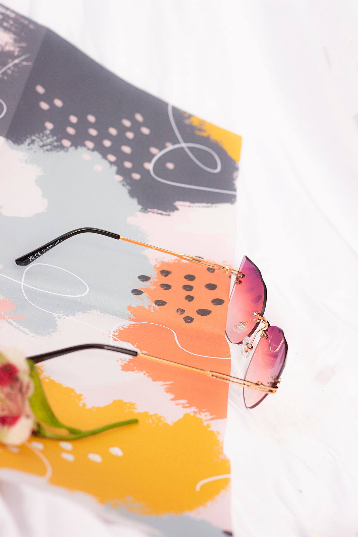 Gem Cut Rimless Cat Eye Sunglasses - Sugar + Style