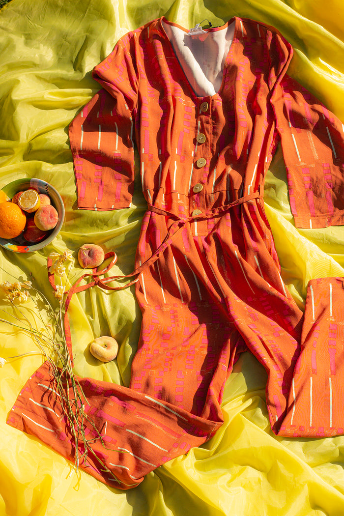 Printed Loose Fit Jumpsuit With Statement Buttons Skinny Belt - Sugar + Style